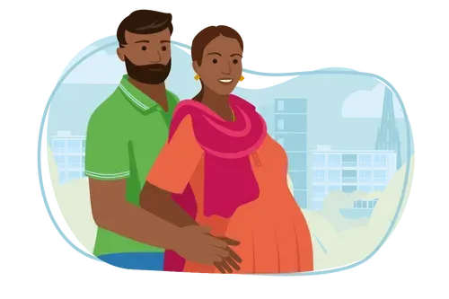 Man and pregnant woman standing together. Man's arms around pregnant woman.
