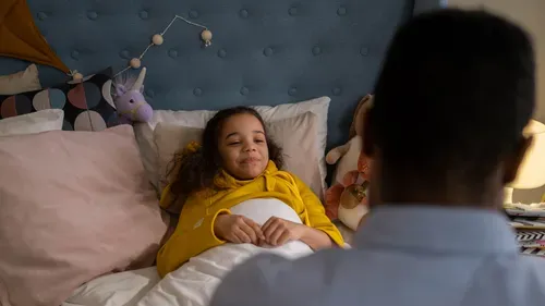 Girl lying in bed
