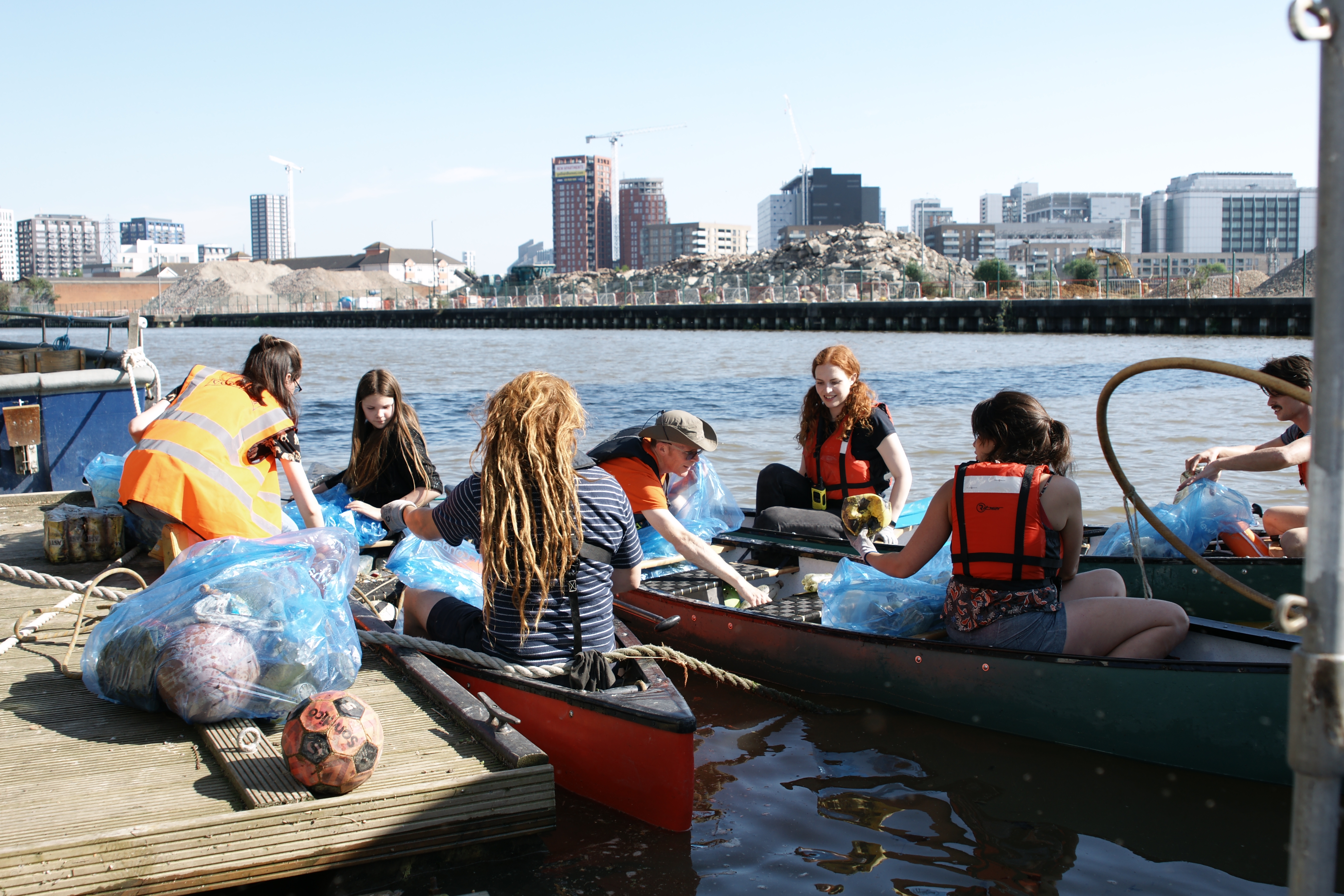 volunteers on the river Lea at Cody Dock