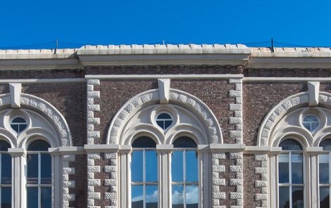 A front view of south shields museum and Art Gallery- with a blue sky above