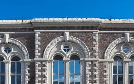 A front view of south shields museum and Art Gallery- with a blue sky above