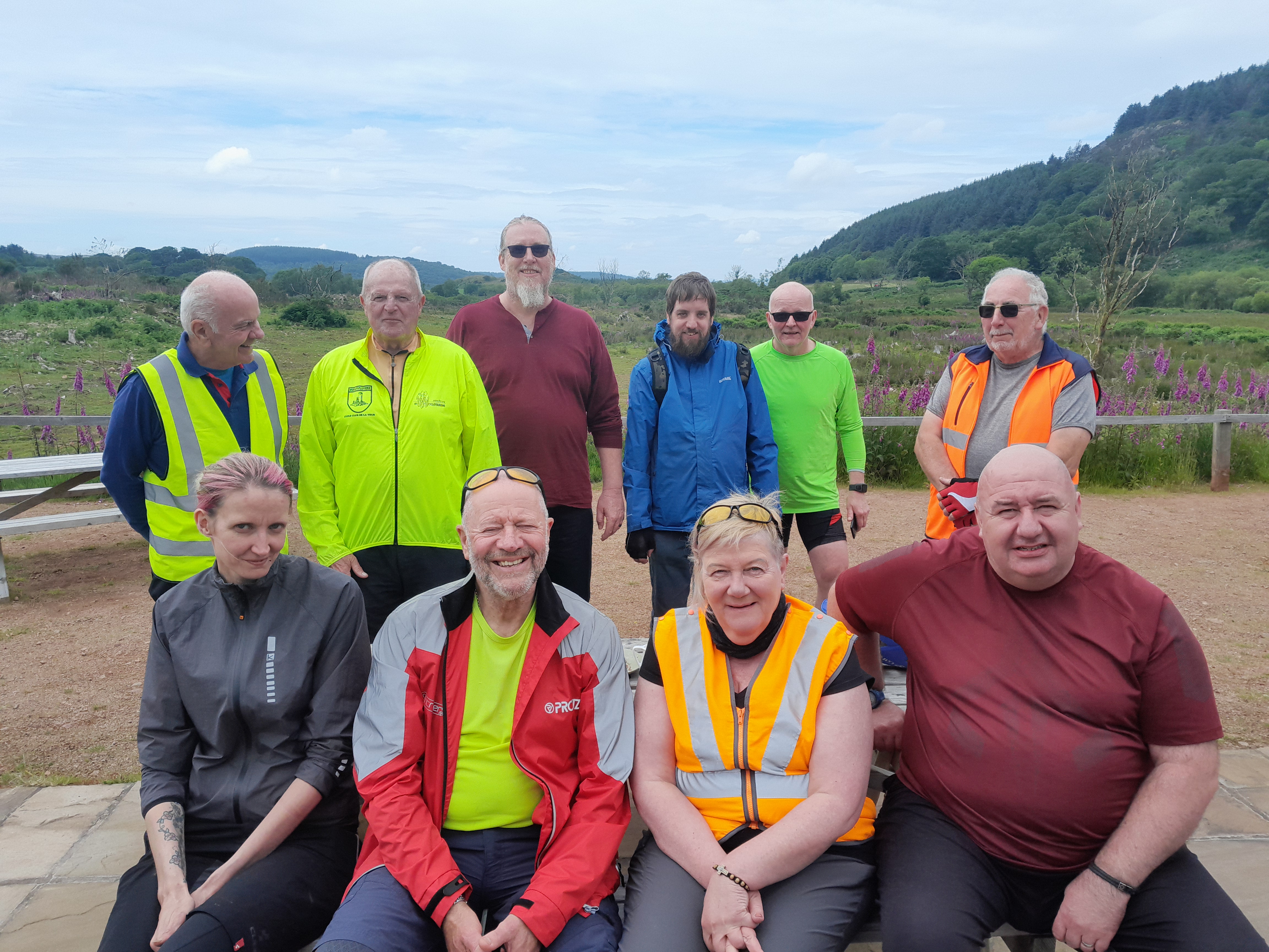 participants on an ebike ride posing for a photo at Bainloch deer park