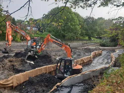 Excavators creating the new channel and pond