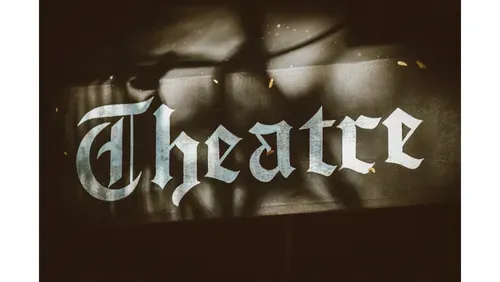 Theatre in fancy font