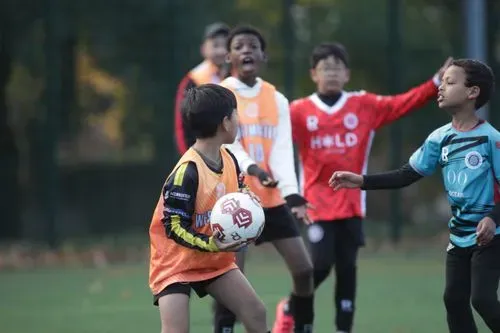 Children playing football
