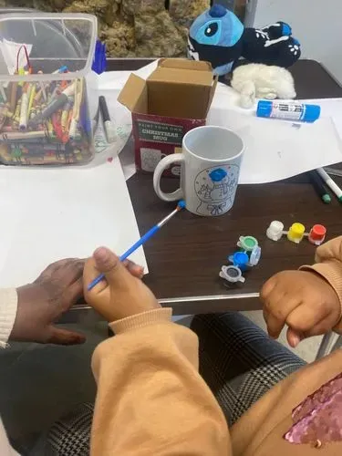 Children painting mugs