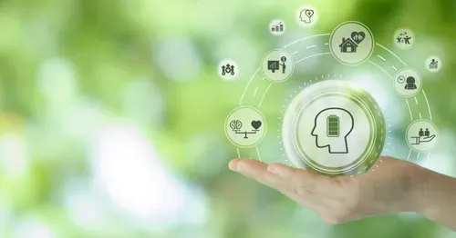 A hand holding health icons