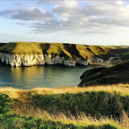 Chalk cliffs meeting the sea