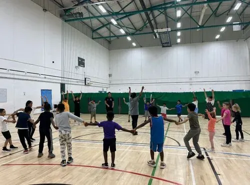 children playing a group game in a circle