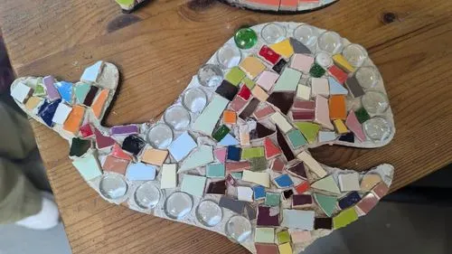  colourful mosaic in the shape of a whale