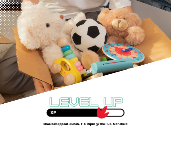 Toy donations in a cardbord box