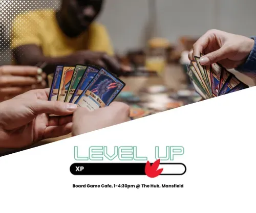 Hands holding character cards for a board game.