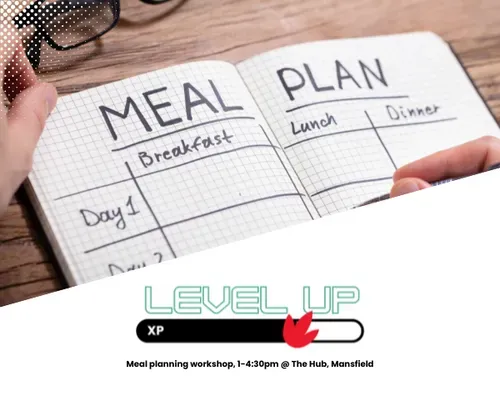 notebook open on table with meal plan written as title