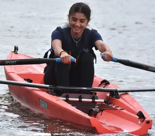 Girl in beach sprint boat