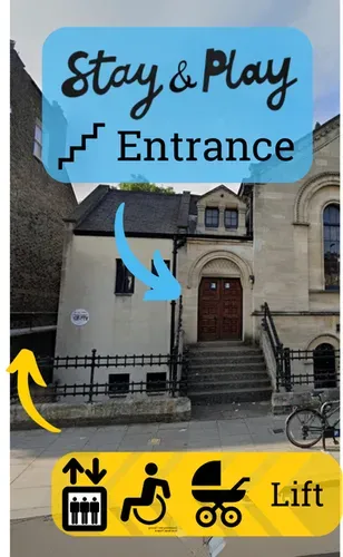 The big beautiful stone building of the Round Chapel Old School Rooms with three big windows at the front.  Text describes how there are two entrances to the main hall, via a short flight of steps or via a ramp to the lift entrance.