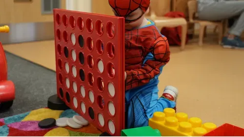 Child playing in stay and play room