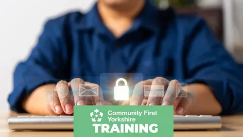 Close-up of hands typing on a keyboard with digital security icons and a padlock symbol overlay, representing cyber security. Community First Yorkshire Training branding appears at the bottom of the image.