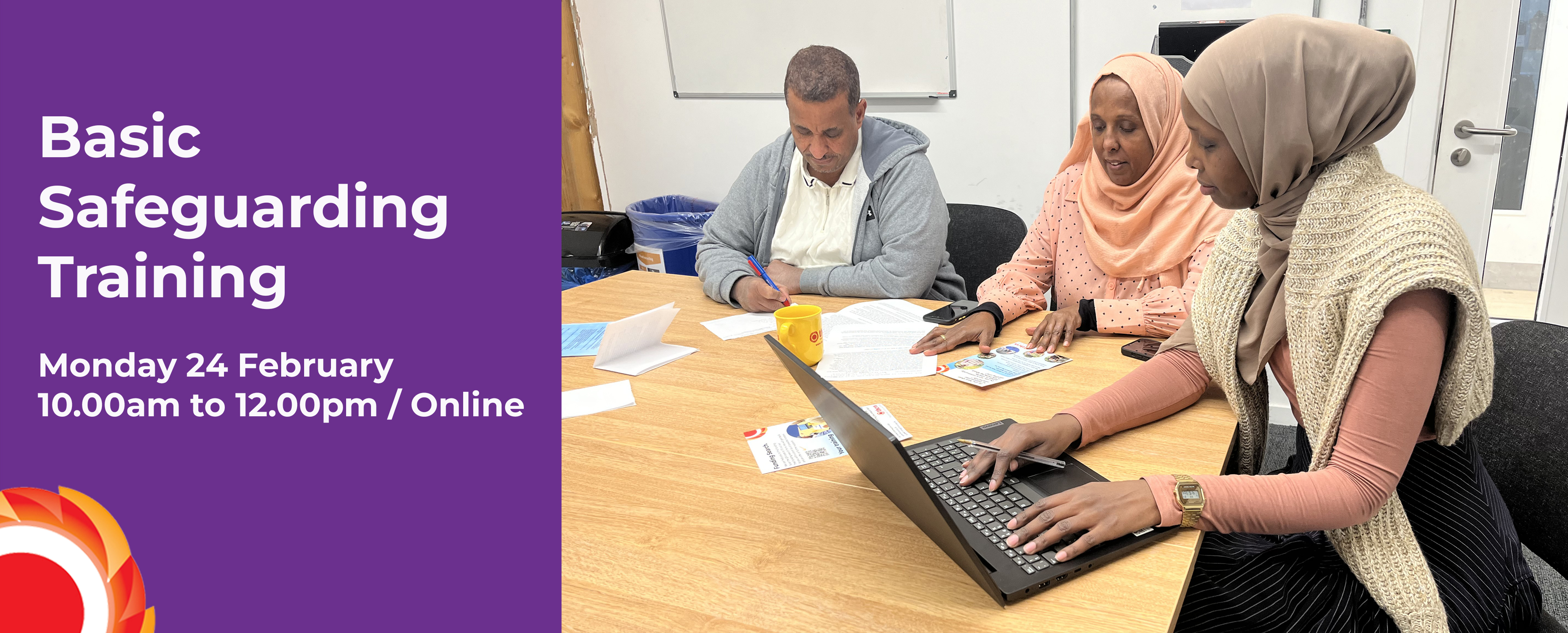 Photograph of THCVS Development Officer providing training to two of our members. 