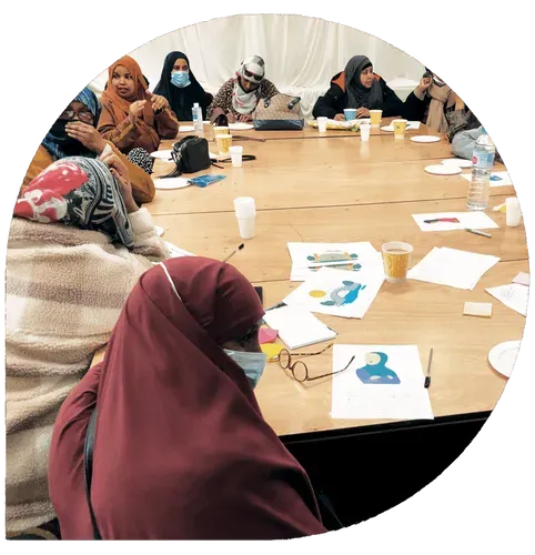 Image of Somali women sitting around a table
