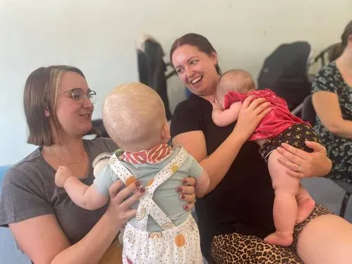 Two mums and their babies having fun at one of our groups