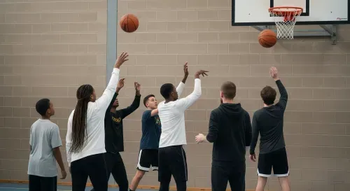 Young people playing basketball