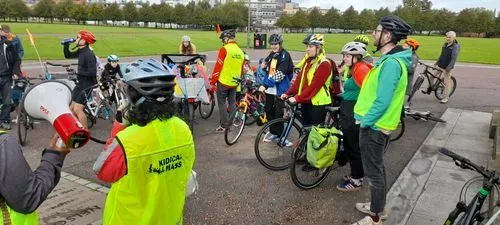 People standing with their bikes