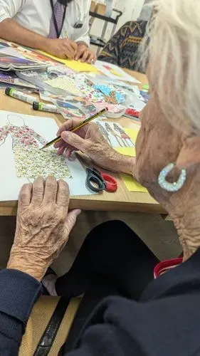 a lady drawing a 70s outfit