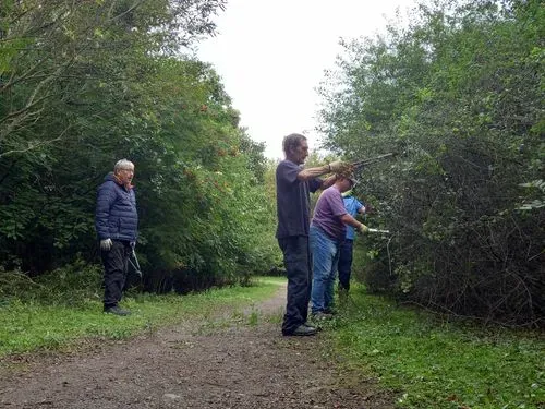 Our team of volunteers lopping and chopping overgrowth along our bridleway. 